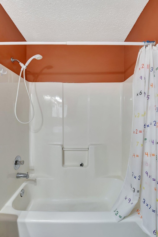 bathroom with a textured ceiling