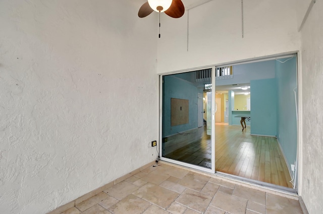 spare room featuring ceiling fan and billiards