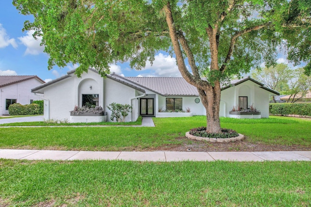 view of front facade with a front yard