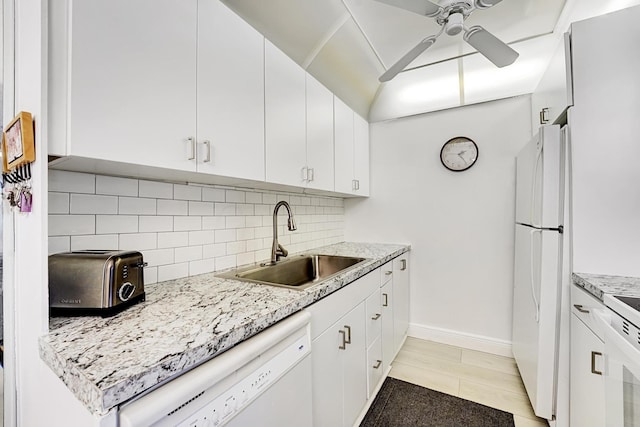 kitchen with ceiling fan, white cabinets, sink, and white appliances