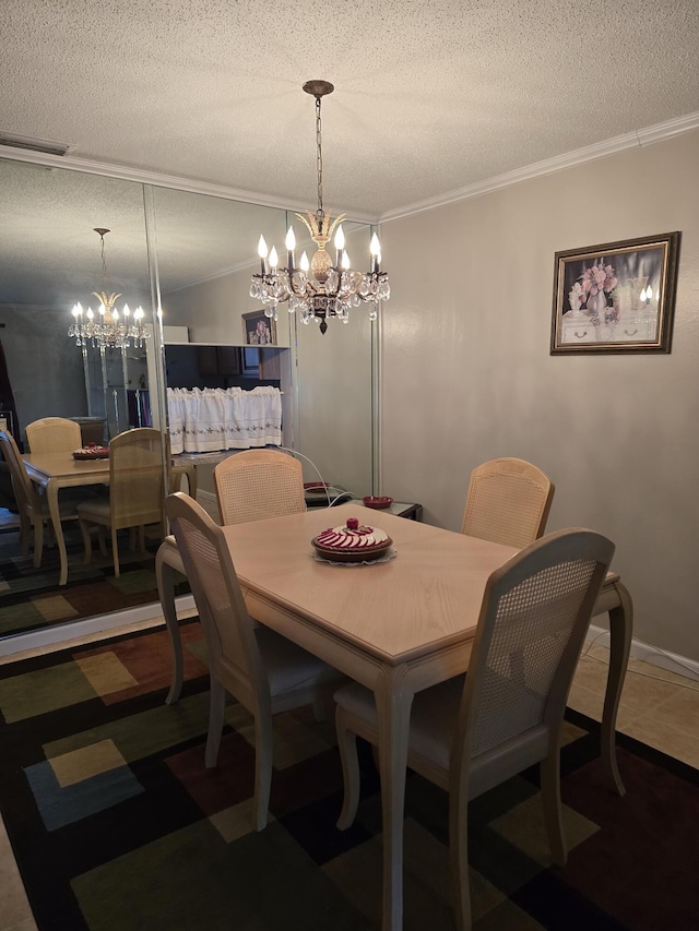 dining room featuring a textured ceiling, ornamental molding, and a chandelier