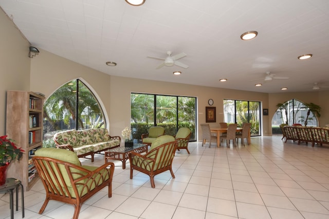 living room with light tile patterned floors and ceiling fan