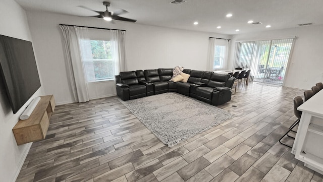 living room with ceiling fan