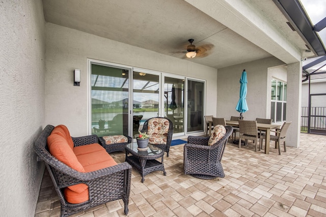 view of patio featuring ceiling fan and outdoor lounge area