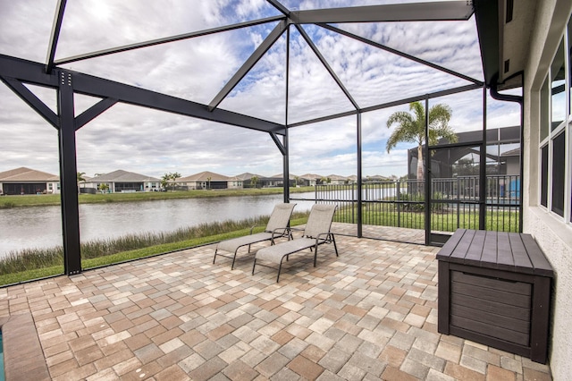 view of patio with a water view