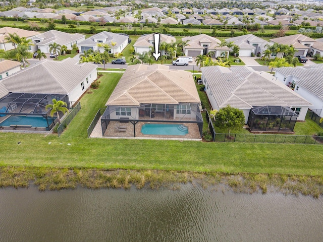 drone / aerial view with a water view