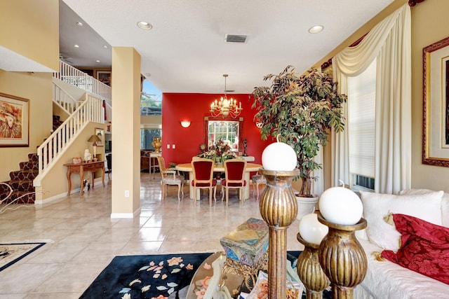 living room featuring a chandelier