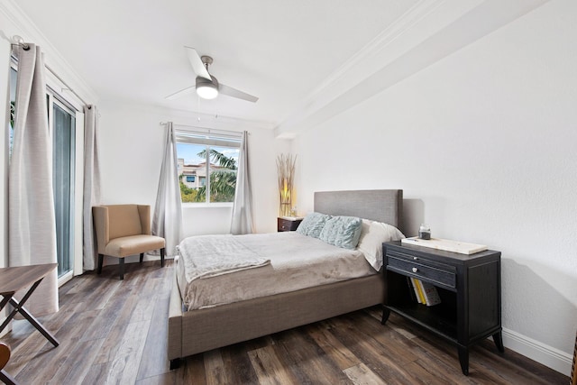 bedroom featuring ceiling fan, dark hardwood / wood-style flooring, and crown molding