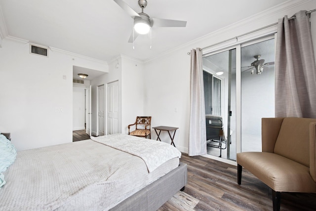 bedroom with ceiling fan, dark hardwood / wood-style flooring, and crown molding