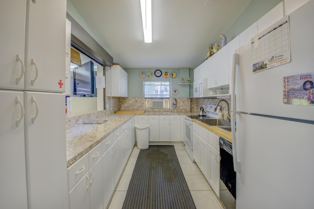 kitchen with white cabinetry, tasteful backsplash, light tile patterned floors, cooling unit, and white appliances