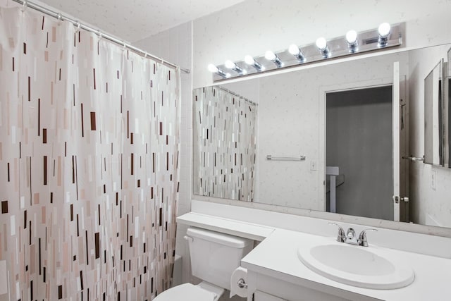 full bathroom with vanity, toilet, and shower / bath combo with shower curtain