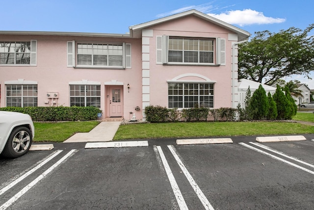 view of front of house with a front yard