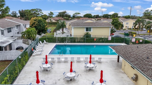 view of swimming pool featuring a patio