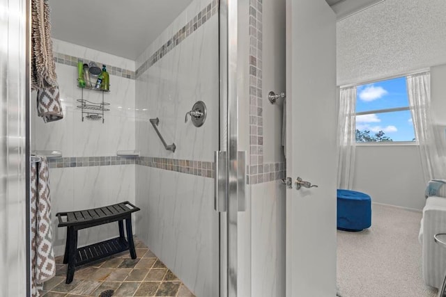 bathroom featuring an enclosed shower