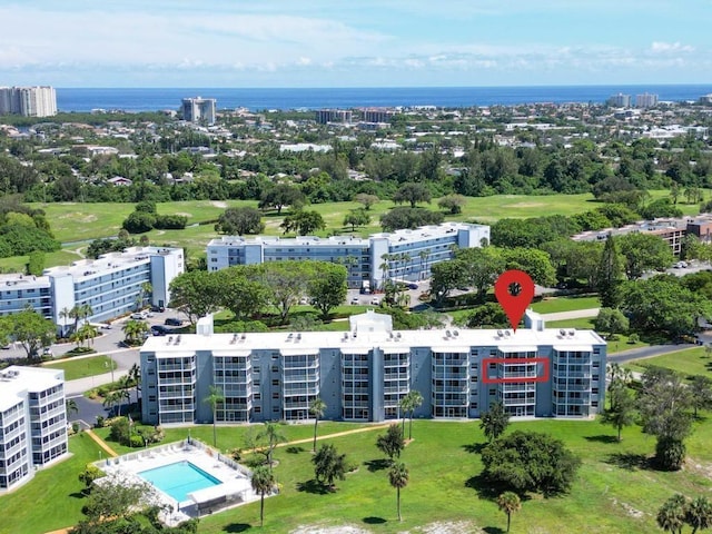 birds eye view of property featuring a water view