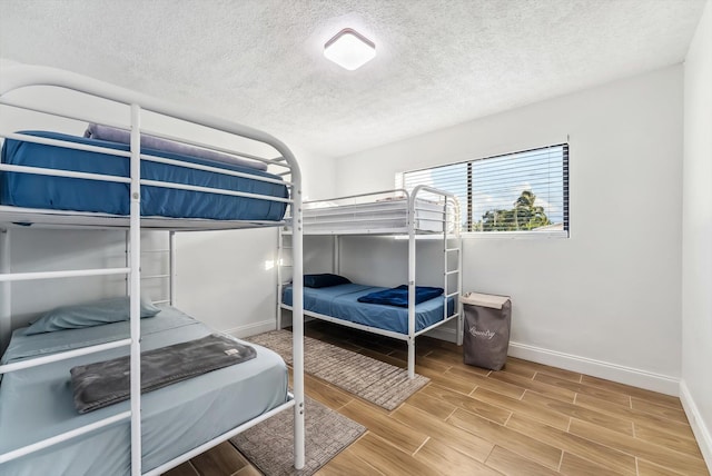 bedroom featuring a textured ceiling