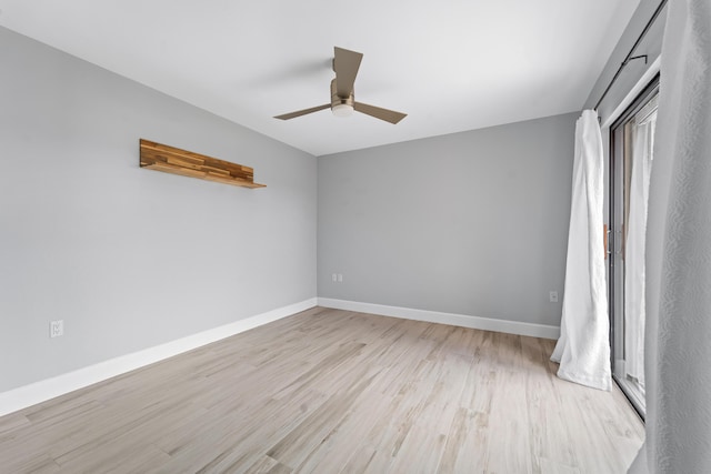 unfurnished bedroom with ceiling fan and light wood-type flooring