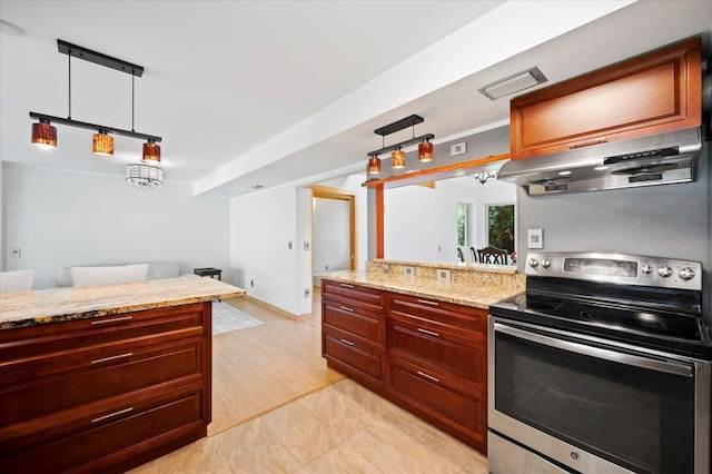 kitchen featuring light stone counters, extractor fan, hanging light fixtures, and electric range