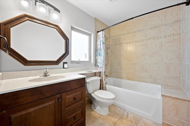 full bathroom with vanity, shower / bath combination with curtain, and toilet