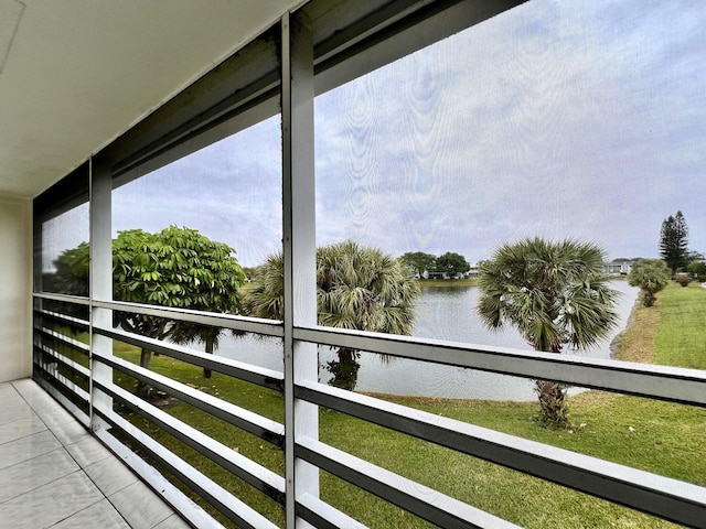 balcony featuring a water view