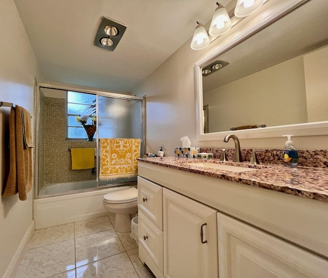 full bathroom with combined bath / shower with glass door, vanity, and toilet