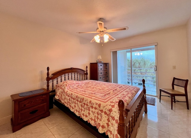 bedroom featuring ceiling fan, light tile patterned floors, and access to outside