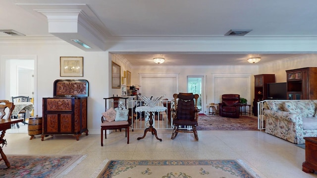 interior space featuring crown molding, visible vents, and baseboards