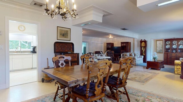 dining room with visible vents and crown molding