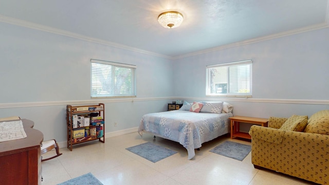 bedroom with baseboards and ornamental molding