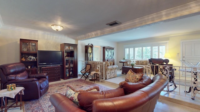 tiled living room with ornamental molding and visible vents