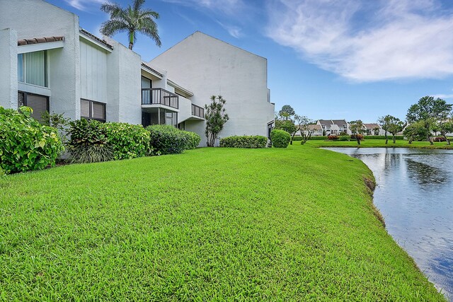 view of yard with a water view