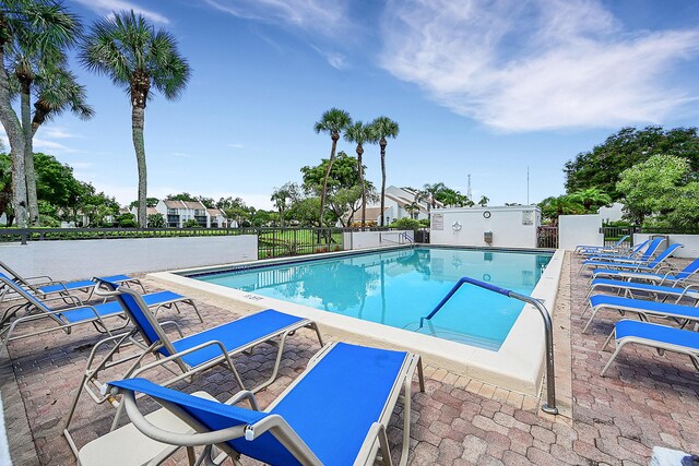 view of pool featuring a patio