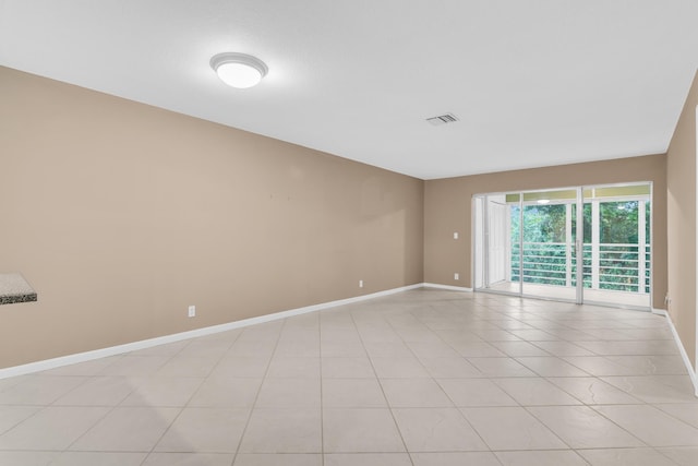 view of tiled spare room