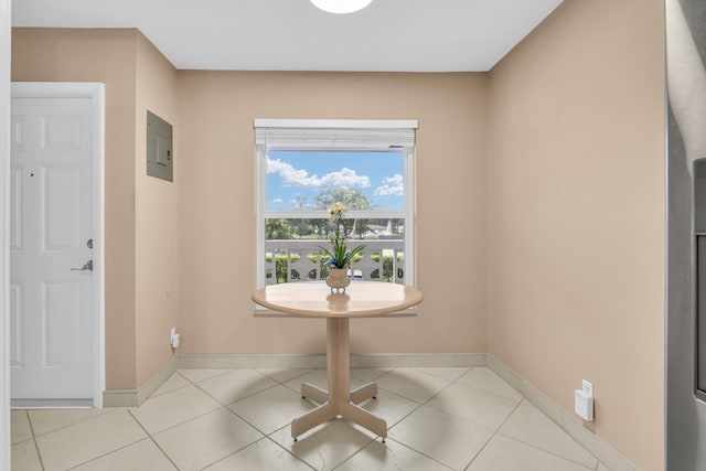 interior space featuring electric panel and light tile patterned floors