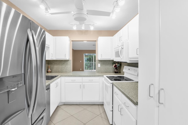 kitchen with white cabinetry, decorative backsplash, stainless steel appliances, and light tile patterned flooring