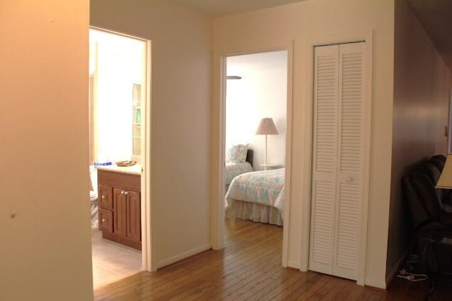 hallway featuring light hardwood / wood-style floors