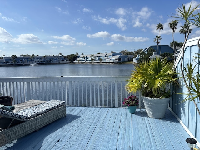 wooden terrace with a water view