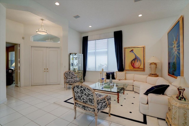 living room featuring light tile patterned flooring