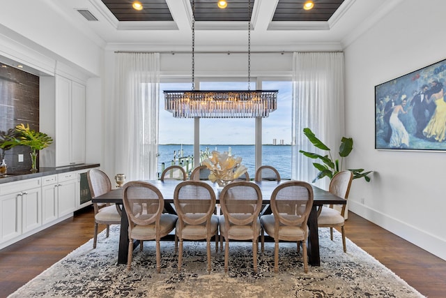 dining room featuring a water view, wood ceiling, ornamental molding, dark hardwood / wood-style floors, and beamed ceiling