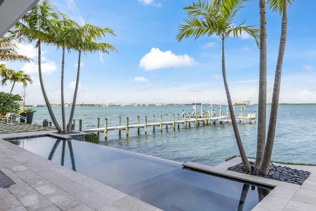 dock area featuring a water view