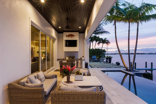 view of patio / terrace featuring an outdoor kitchen, a grill, and outdoor lounge area