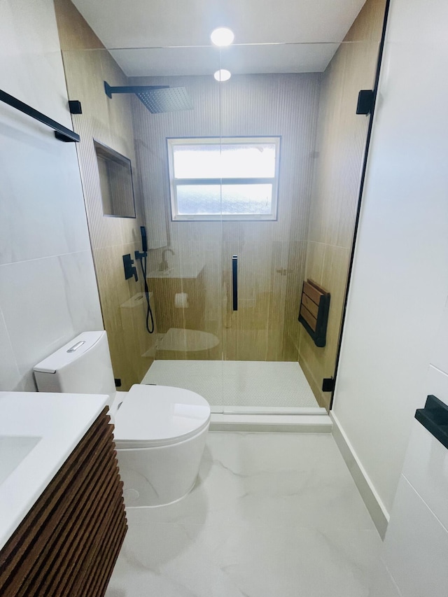 bathroom featuring toilet, walk in shower, and vanity