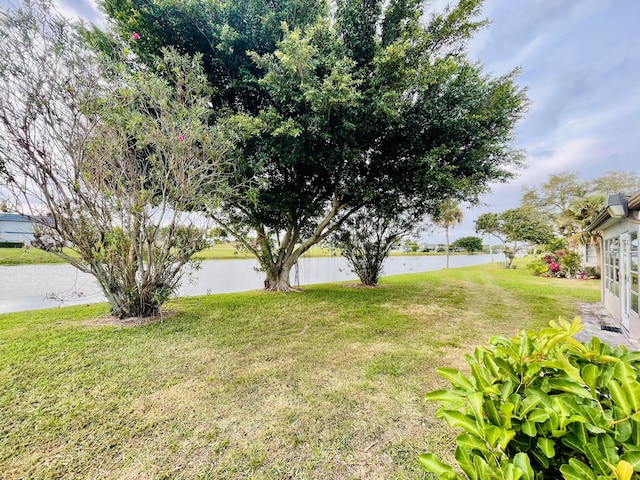 view of yard with a water view