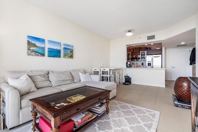 living room with light tile patterned floors