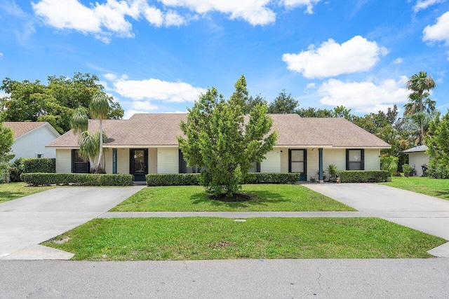 single story home with a front lawn