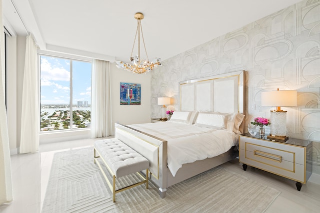 bedroom featuring a chandelier