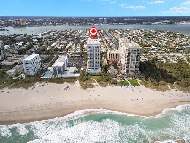 aerial view with a beach view and a water view