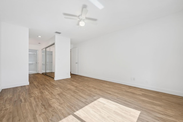 interior space featuring ceiling fan and light wood-type flooring