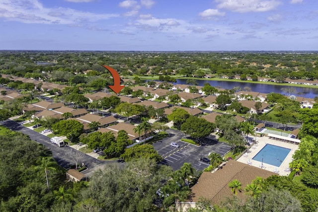 birds eye view of property featuring a water view