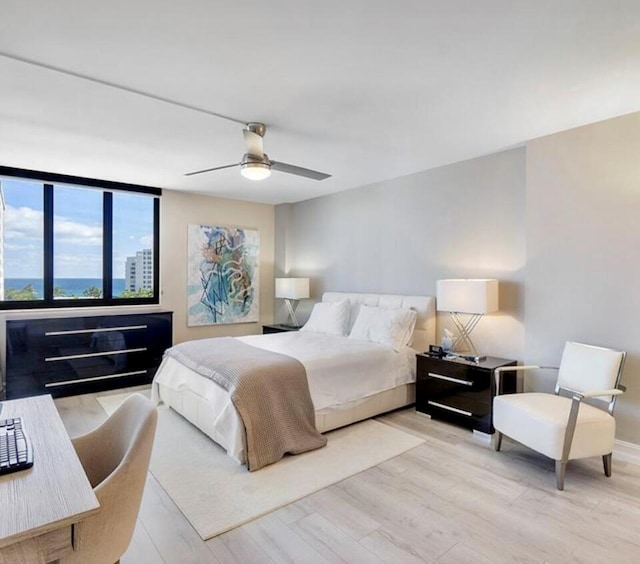 3420 S Ocean Blvd Unit 8Q, Highland Beach, FL 33487 - bedroom featuring wood finished floors and a ceiling fan